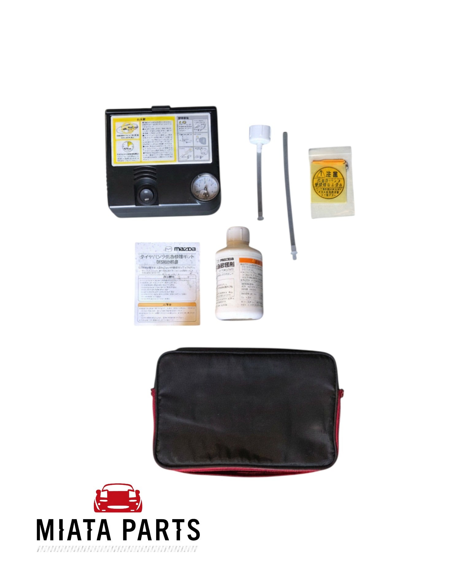Miata Parts NZ factory tyre repair kit for Mazda MX5 NC including air compressor, tyre sealant, and tools in a bag.